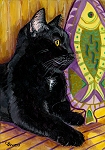 Brock - black cat with golden eyes next to a fish platter