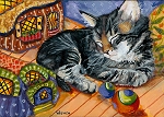 Jamar - gray tabby kitten with painted rocks in background